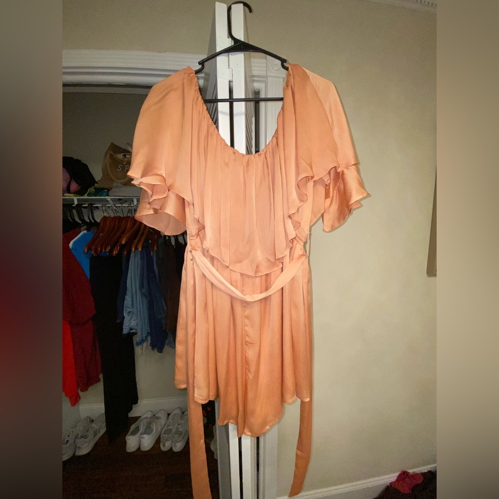Apricot silk off the shoulder romper with ruffles and waist tie